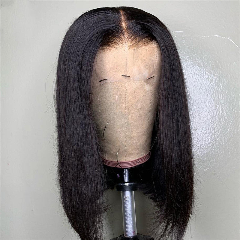 Elegant Medium Length Human Hair Wig with Versatile Bangs | Natural Color1