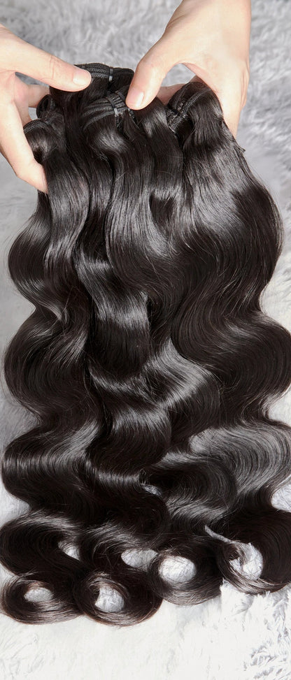 Virgin Peruvian Body Wave Human Hair Bundles – Tangle-Free, Long-lasting & Restyleable